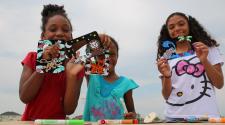 This image shows a group of girls finishing an art project.