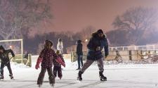 This image shows some people skating around during S'mores and More.
