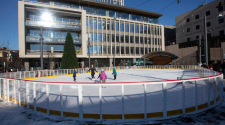This image shows people skating on the ice at Broadway Square.