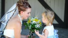This image shows the bride and flower girl before the wedding at Trollwood Park.