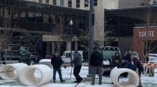 Crews laying skating rink at Broadway Square