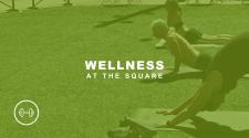 people doing yoga with wellness at the square over it