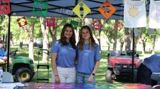 This image shows two interns at Midwest KidFest.